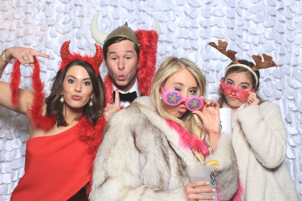 Having fun in elegant wedding photo booth